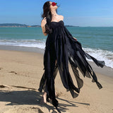 2025 Sanya seaside vacation dress sexy pure desire irregular skirt halter split neck black beach dress