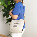 HULIANFU 2025 Canvas bucket bag women's Korean version super fire affordable girls bag wide shoulder strap large capacity single shoulder messenger tote bag