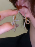 High-end light luxury zircon bow earrings, women's personality design earrings, sweet versatile ear jewelry