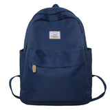 2025 Large capacity women's backpack women's high-end black and white schoolbag simple junior high school high school college student backpack