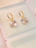 Early summer new lucky grass earrings micro-inlaid temperament four-leaf clover cute ear buckle lady temperament versatile silver needle earrings