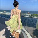 2025 temperament neck halter dress super fairy seaside vacation atmosphere beach skirt loose floral short skirt