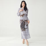 2025 suit women's high-end 2025 new printed loose long-sleeved T-shirt split skirt two-piece set