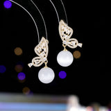 2025 Temperament niche high-end earrings wholesale new trendy fashion small simple zircon inlaid pearl butterfly earrings