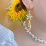 Atmospheric high-end opal flower leaf fringed earrings women's new trendy temperament long ear hook light luxury earrings