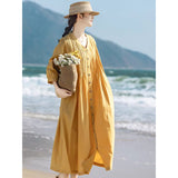 Summer travel literary fan cotton and linen dress, loose V-neck seven-quarter-sleeved organ pleated long cardigan knee-length dress