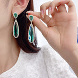 2025 Luxury atmospheric heavy industry earrings wholesale elegant temperament banquet dress with translucent long water drop-shaped zircon earrings