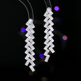2025 Luxury exaggerated earrings design sense geometric wavy zircon inlaid long banquet dress with earrings wholesale