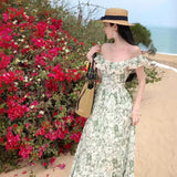2025 off-the-shoulder suspender skirt women's summer 2025 new high-end one-word shoulder coffee break skirt oil painting print dress
