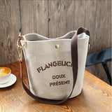 HULIANFU 2025 Canvas bucket bag women's Korean version super fire affordable girls bag wide shoulder strap large capacity single shoulder messenger tote bag