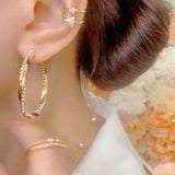 Diamond ring earrings  new trendy light luxury atmosphere exaggerated earrings ear buckles women's high-end silver needle earrings
