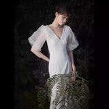 2025 White fishtail dress dinner  new travel photography light wedding dress celebrity host art test performance clothes small trailing