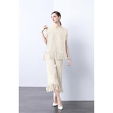 Miyake 2025 style pleated fringed design sense loose irregular top thin wide-leg pants two-piece suit women
