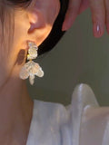 Light luxury high-end shell flower earrings niche design earrings women's flash diamond silver needle earrings new popular earrings