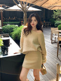 2025 popular autumn and winter new temperament solid color knitted sweater + hip wrap and thin short skirt two-piece set 25170