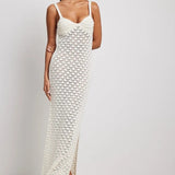 HULIANFU New summer new  vacation style knitted long skirt women's suspender skirt side split halter hollow pattern knitted skirt