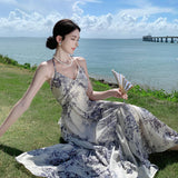 2025 Seaside vacation style new Chinese beach skirt high sense retro ink temperament beautiful v-neck suspender dress