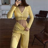 HULIANFU New autumn and winter  new knitted suit women's clothing perspective casual solid color hollow high-waisted trousers commuter suit