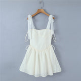 Hulianfu White Strap Dress 2023 Spring Summer New Sexy Holiday Fashion Slim Waist Hollow Tie Short Mini Dress For Women