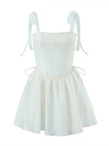 Hulianfu White Strap Dress 2023 Spring Summer New Sexy Holiday Fashion Slim Waist Hollow Tie Short Mini Dress For Women